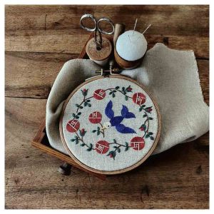 Hand-Embroidered Avian Elegance