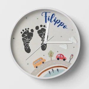 A baby footprint DIY clock with a personalised name.