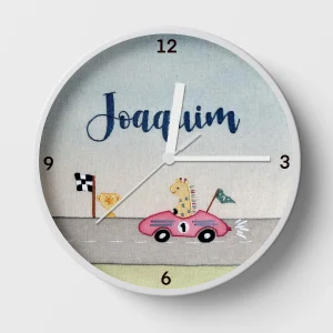 A personalised kids clock with a giraffe in a pink race car