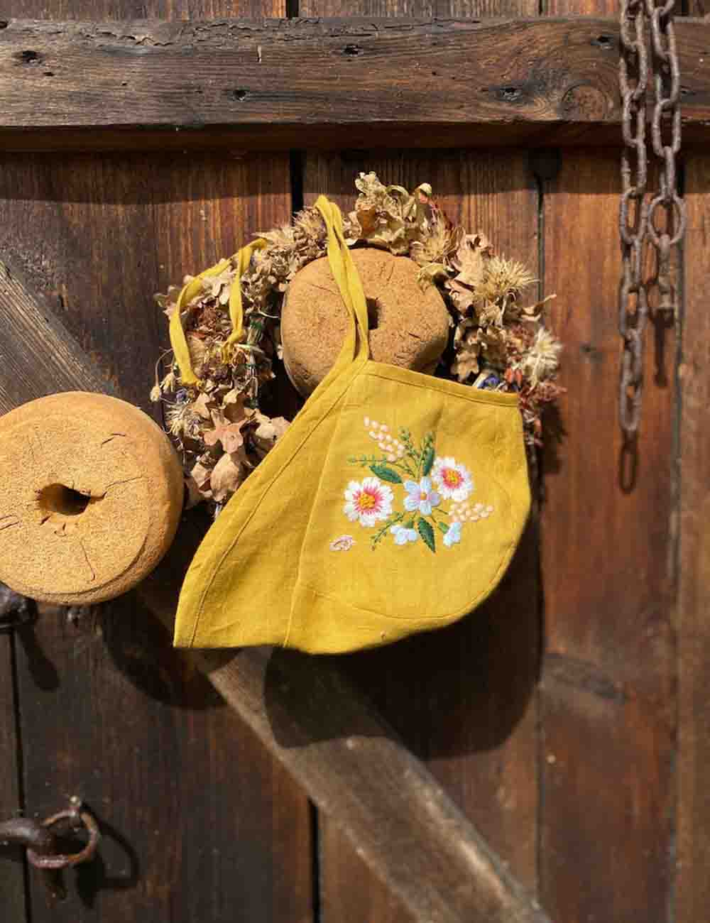 Exquisite Hand Embroidered Linen Baby Bonnet with Botanical Design 3