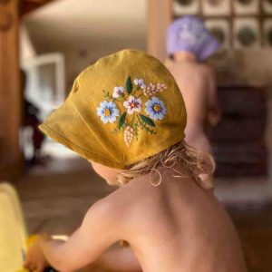 Exquisite Hand Embroidered Linen Baby Bonnet with Botanical Design 2