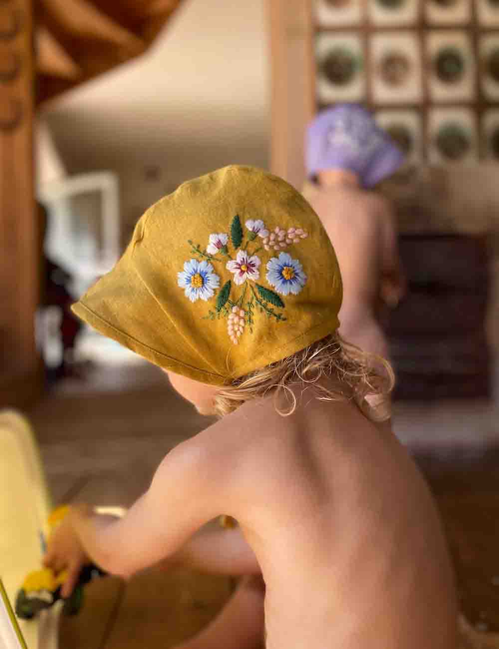 Exquisite Hand Embroidered Linen Baby Bonnet with Botanical Design 2